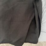 blackout curtains laid out on bed