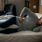 how to sleep with lower back pain in 2026