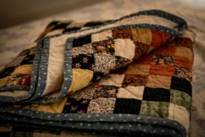 best quilts and coverlets for layered bedding in 2026