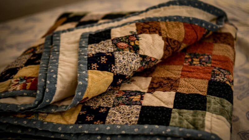 Best Quilts and Coverlets for Layered Bedding in 2026: Building a Bed That Adjusts to Any Season