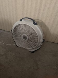 a bedside fan in bedroom