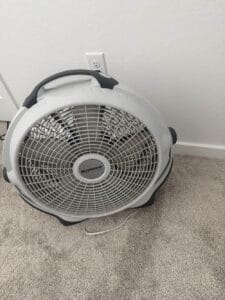 a bedside fan in bedroom