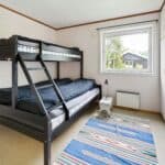 Minimalist bedroom with bunk bed