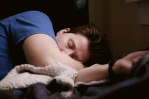 someone in a deep sleep at their home