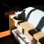an under the bed storage solution using bins