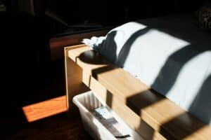 an under the bed storage solution using bins