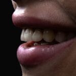 why do i grind my teeth at night