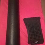 a back stretcher and foam roller in home
