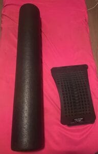 a back stretcher and foam roller in home