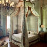 a bed canopy in a bedroom