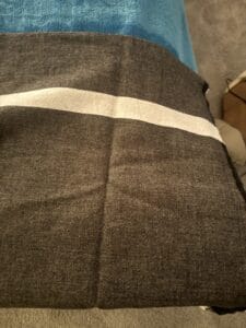 a bed runner on a bed