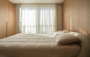 a minimal bedroom layout with mattress