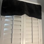 a blackout curtain setup on window