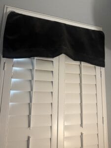 a blackout curtain setup on window