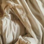 a comforter upclose in bed