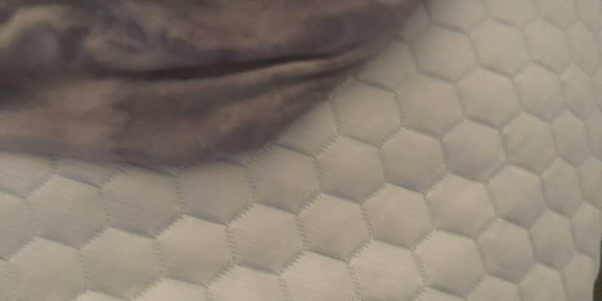 Cooling Blanket vs Cooling Topper: Which Cools a Hot Sleeper Better?
