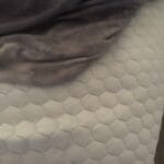 a cooling blanket next to a cooling topper