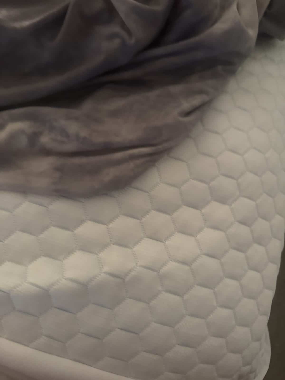 Cooling Blanket vs Cooling Topper: Which Cools a Hot Sleeper Better?
