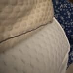 a cooling pillow and cooling mattress topper side by side