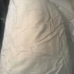 a cooling pillow on mattres shown in full