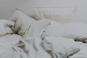 a duvet set up on bed