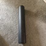a foam roller in a bedroom