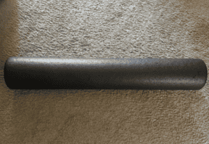 a foam roller laying on the floor