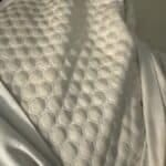 a gel cooling pillow on mattress