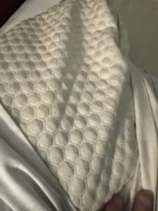 a gel cooling pillow on mattress