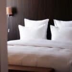 a set of hotel pillows set up in room