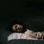 a light sleeper in bed