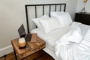 a mattress in a room set up neat organized