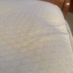 a mattress topper on bed