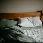 a display of pillows on bed