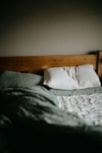 a display of pillows on bed