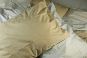 a pillow on a bed for quality sleep