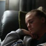 someone sleeping in recliner