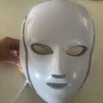 a red light mask for sleep on a counter