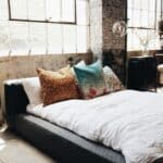 a mattress in a loft bedroom