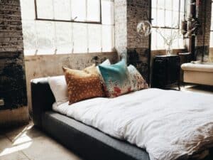 a mattress in a loft bedroom