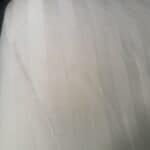 satin sheets in home on bed