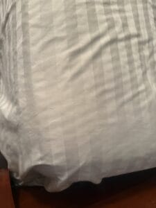 satin sheets on bed