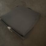 a wedge pillow upclose on floor