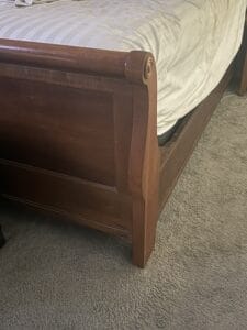 a bed frame with a mattress