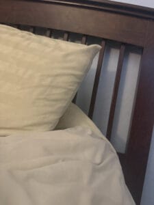 bed setup in home on side corner
