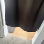 a blackout curtain cut before the ground
