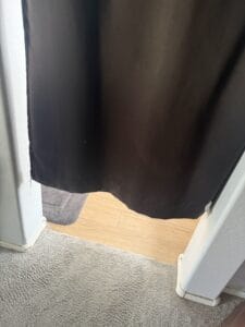 a blackout curtain cut before the ground