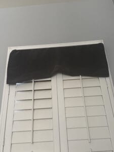 a blackout curtain in window shutter
