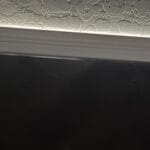 a blackout curtain leaking sunlight