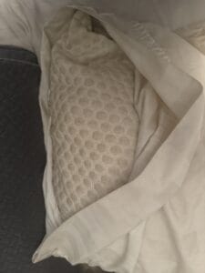 a cooling gel pillow upclose on a bed